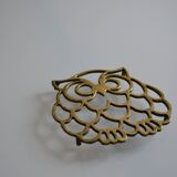 Vintage openwork brass trivet in the shape of an owl or owl