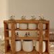 Vintage wooden wall condiment shelf and porcelain pots with geese slip pattern