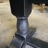 Raw wood table with black base