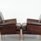 Set of two characterful sheepskin armchairs with a beautiful deep colour