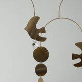 Mobile model Rana . Mobile in abstract brass.