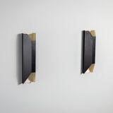 Architectural pair of vintage black metal wall lamps with angular geometric