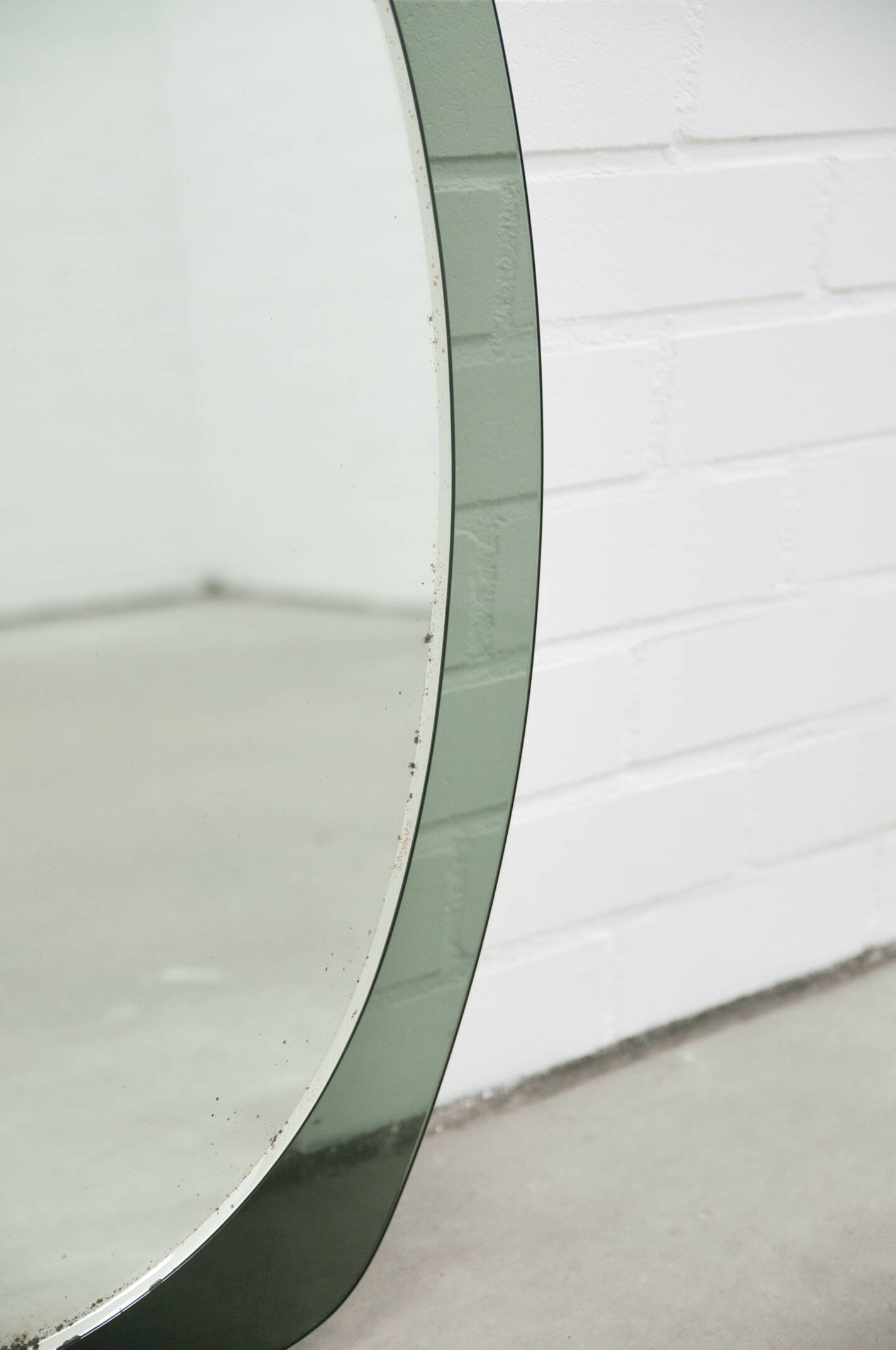 Vintage space age large smoked green glass mirror by veca