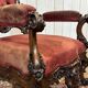 Fauteuil en acajou 19ème richement sculpté de style baroque