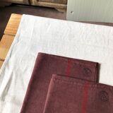 Set of two old tea towels in pure linen tinted in burgundy