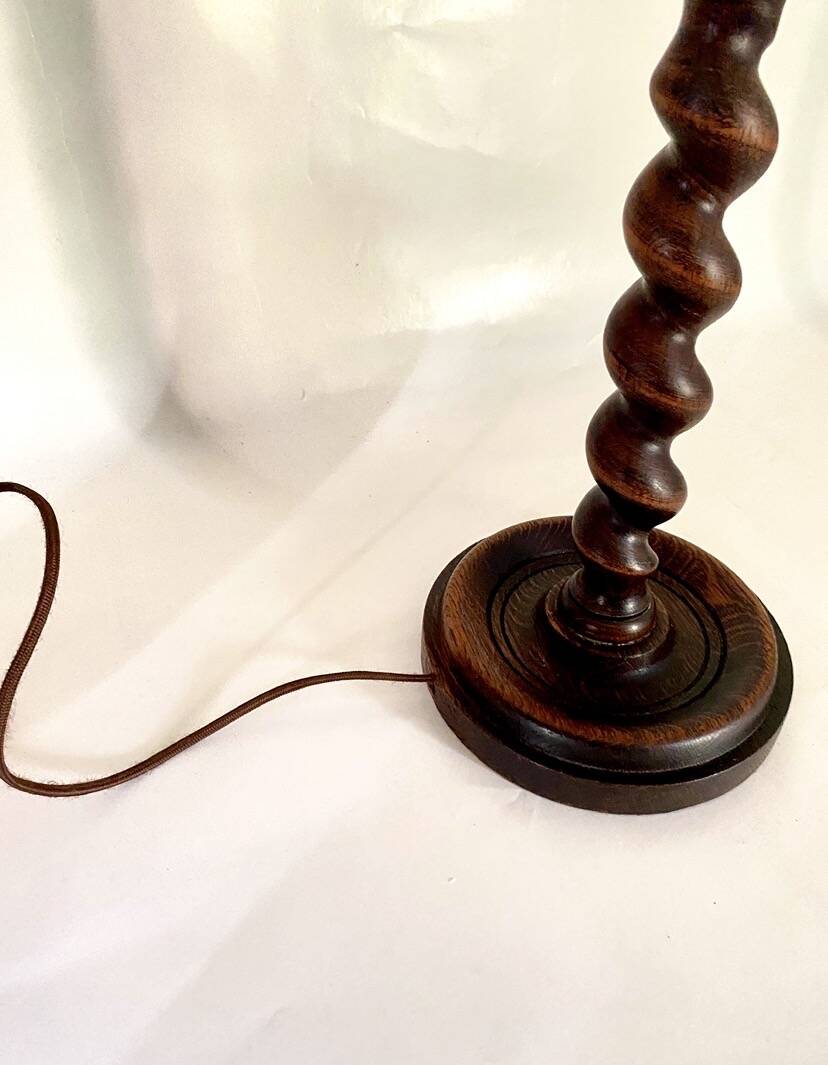Turned wooden lamp base, fabric cable