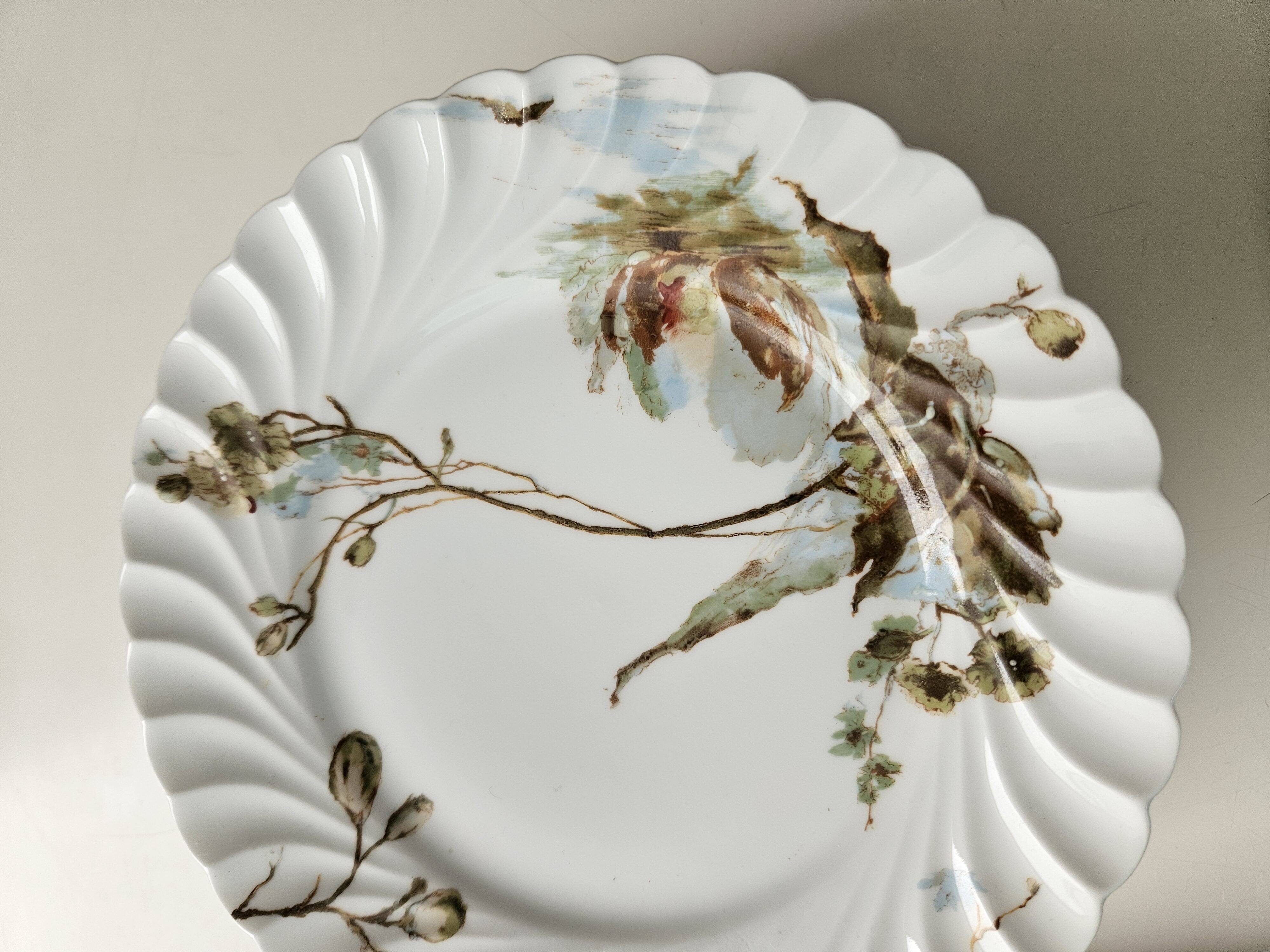 Haviland service plates, dishes on pedestals and soup tureen