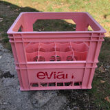 Evian bottle holder in pink plastic