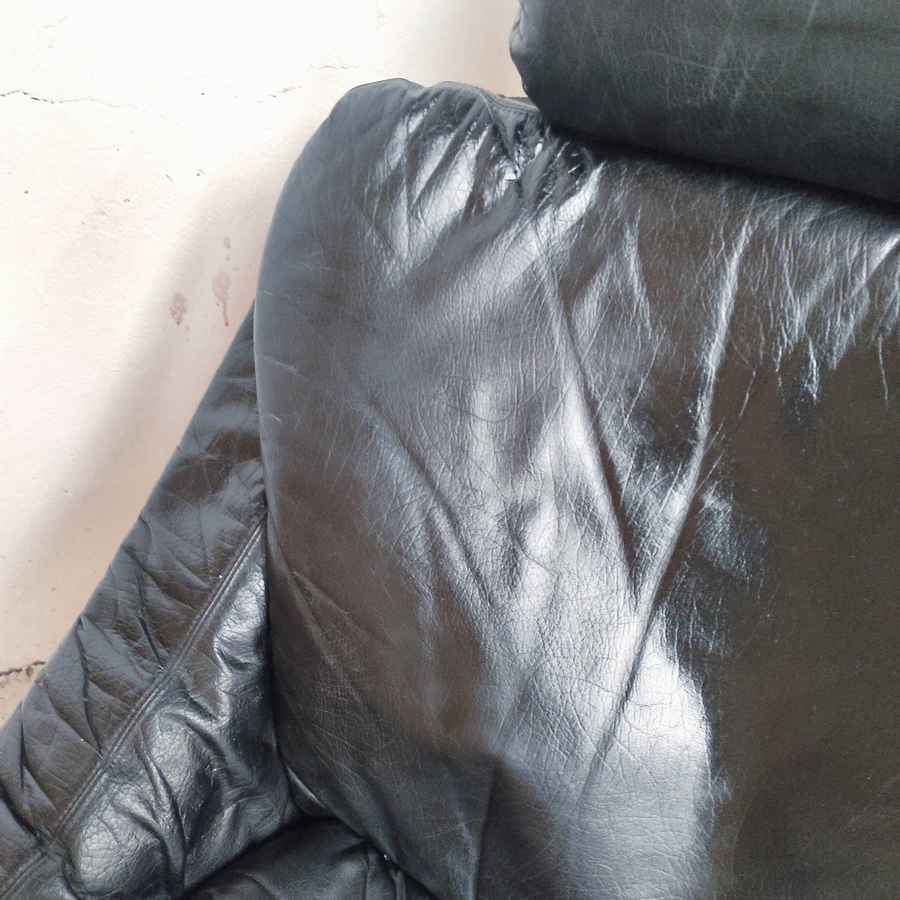 Pair of Kroken armchairs in black leather