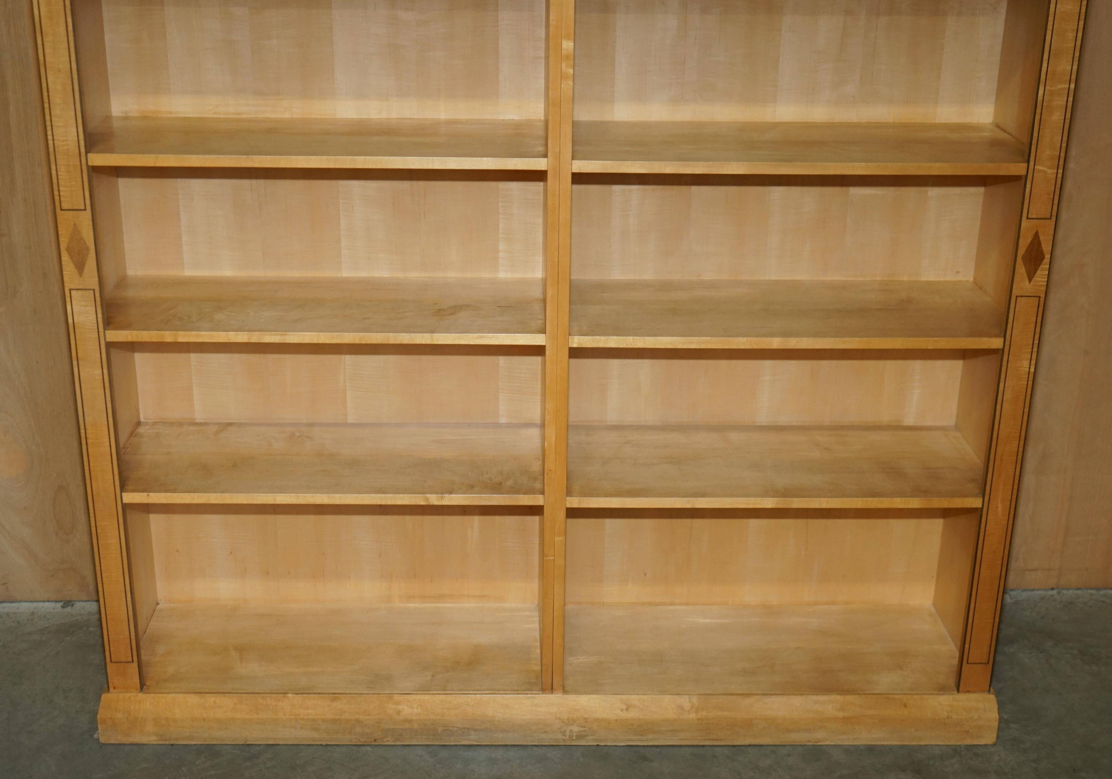 Pair of large open bookshelves in satin birch and walnut, height 2.5 m.