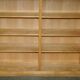 Pair of large open bookshelves in satin birch and walnut, height 2.5 m.