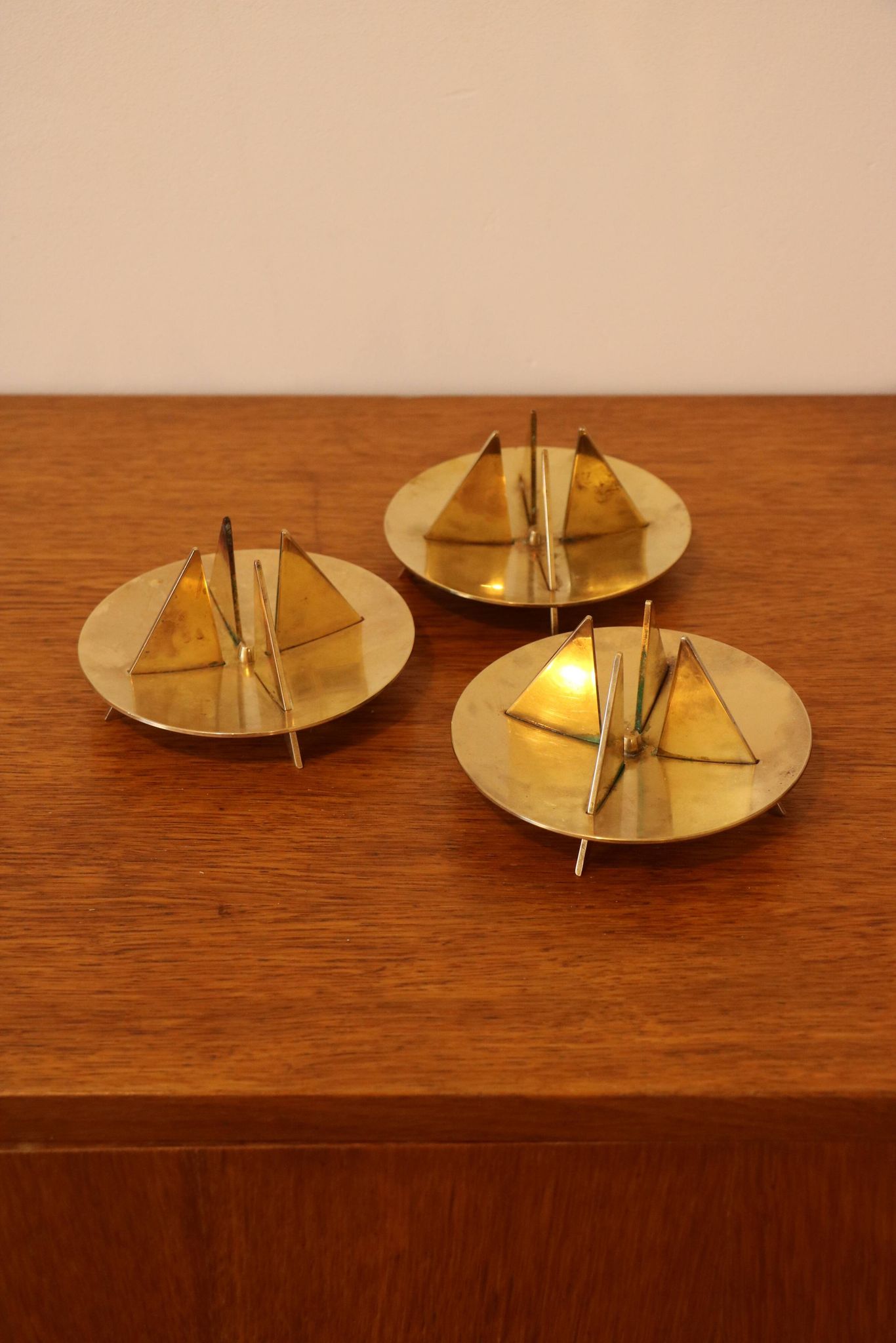 Scandinavian trio of candlesticks in brass by Pierre Forsell for Skultuna.