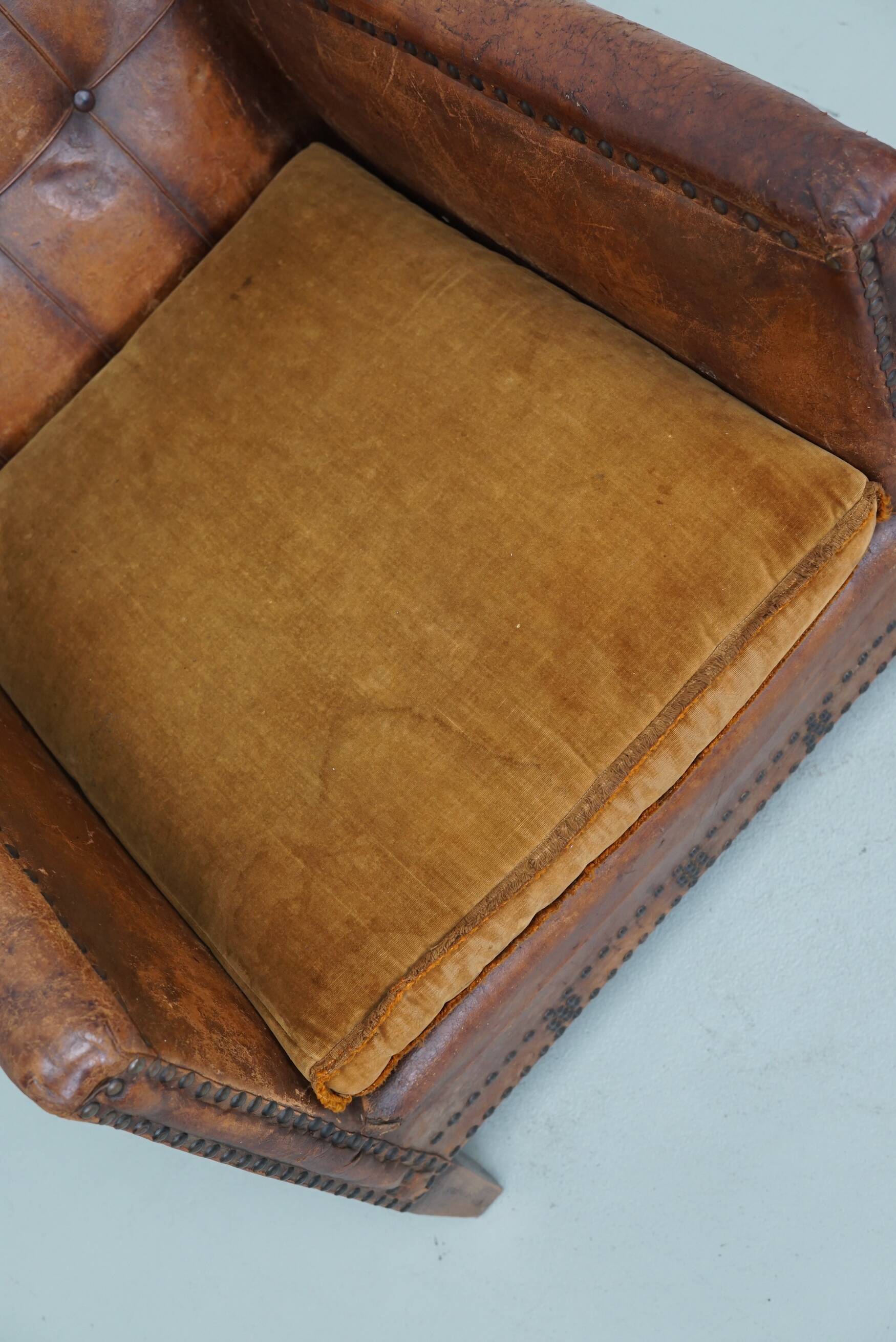 French cognac leather buttoned back club chair