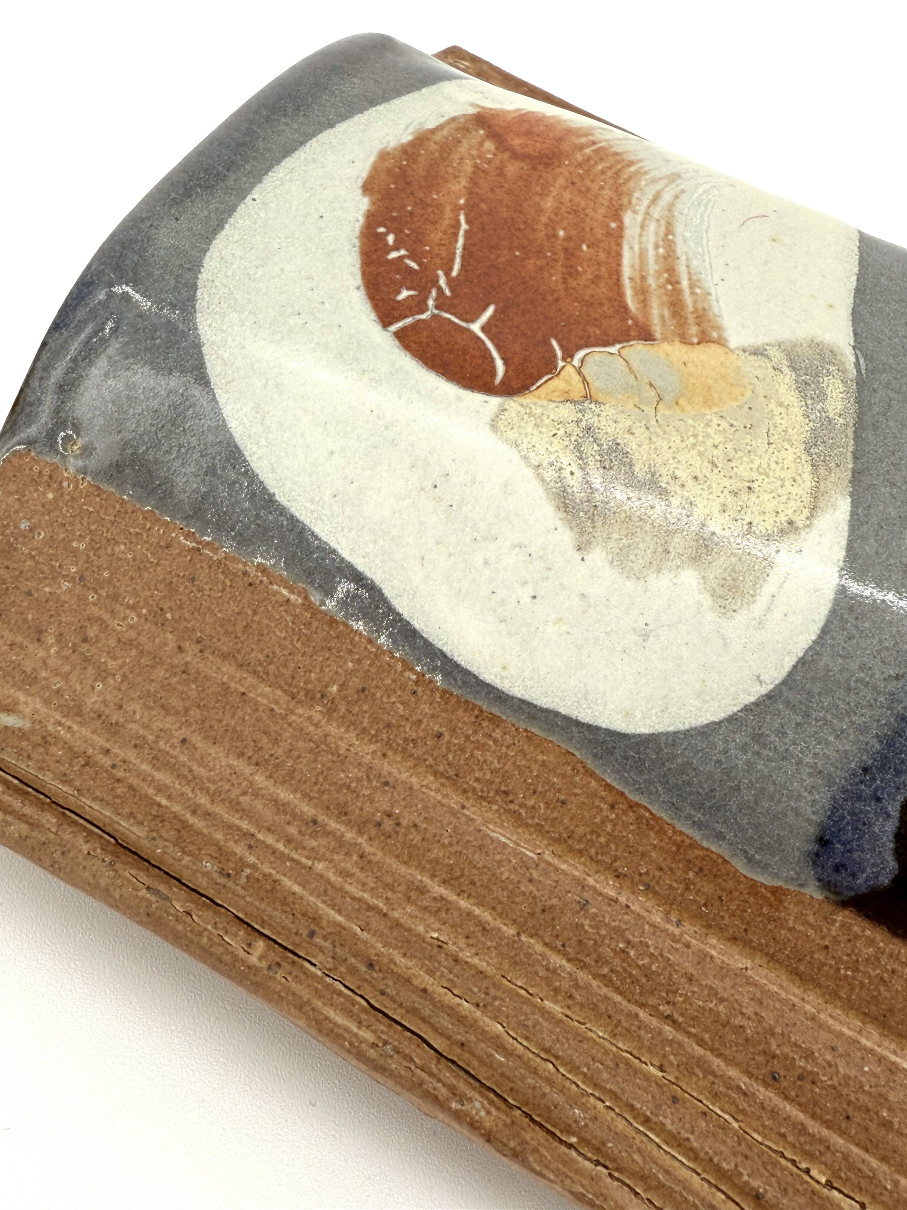 Japanese glazed stoneware vase signed