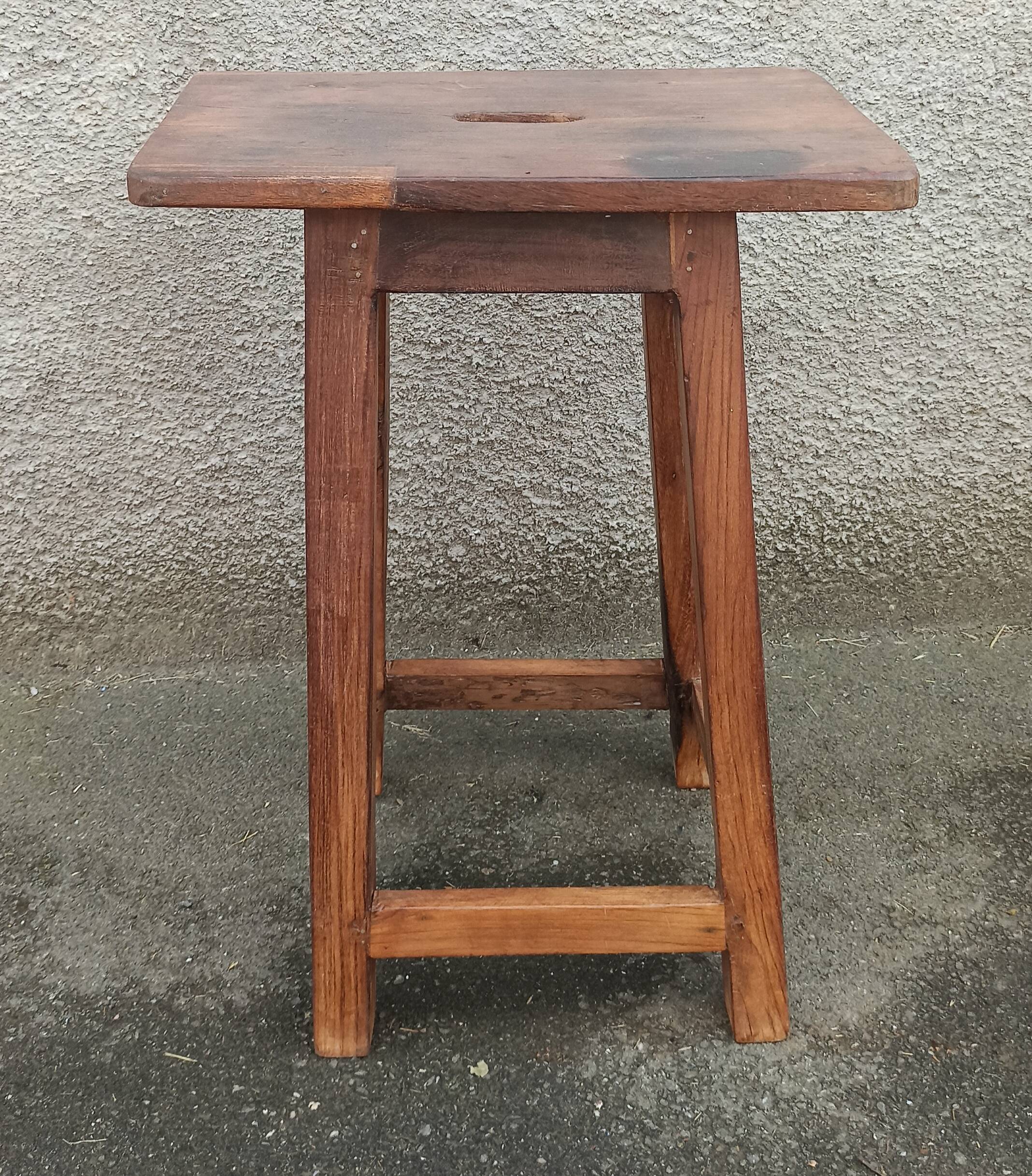 Old wooden high stool