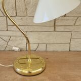 Articulated brass and opaline lamp.