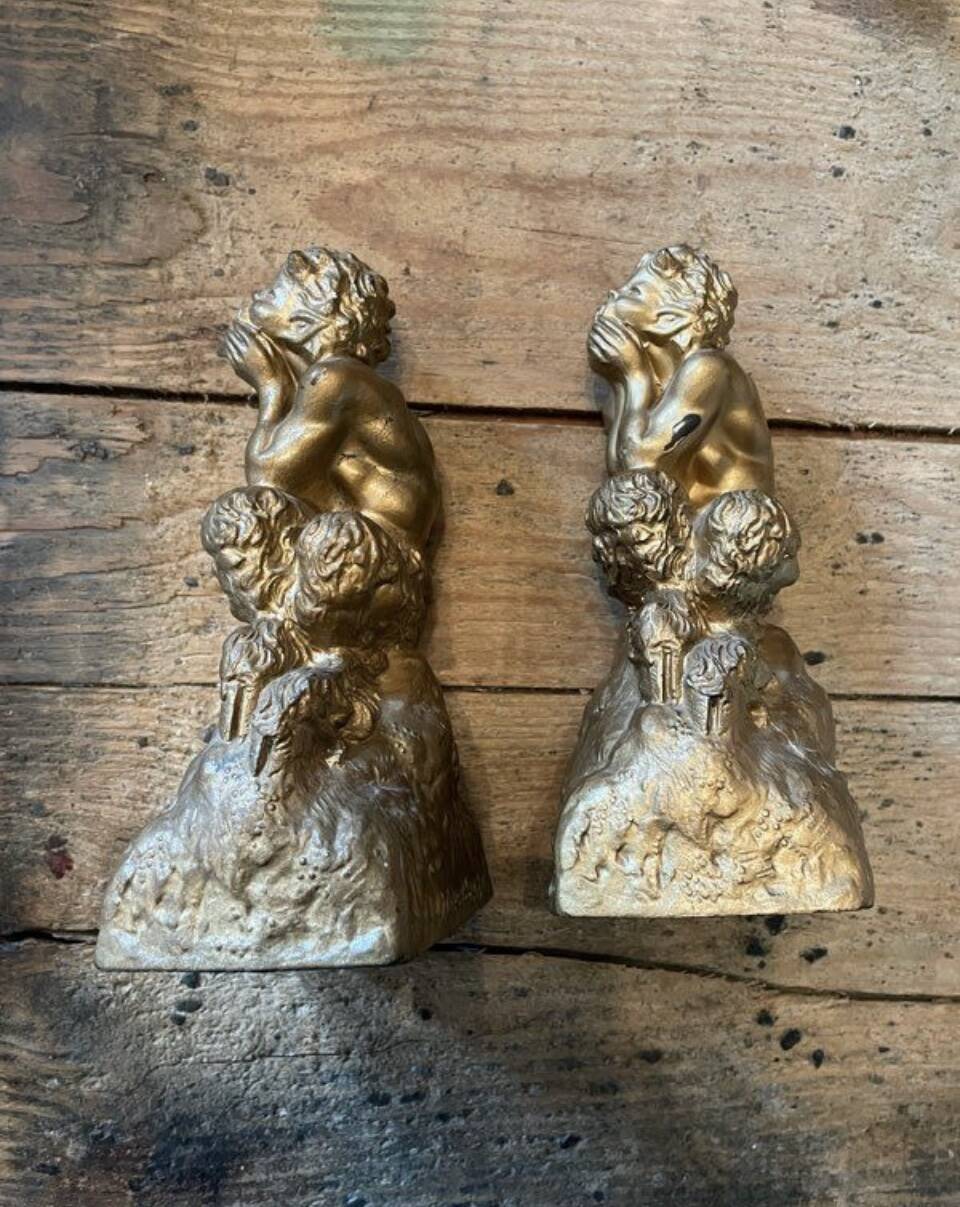 2 Seated satyr sculptures in cast bronze