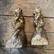 2 Seated satyr sculptures in cast bronze