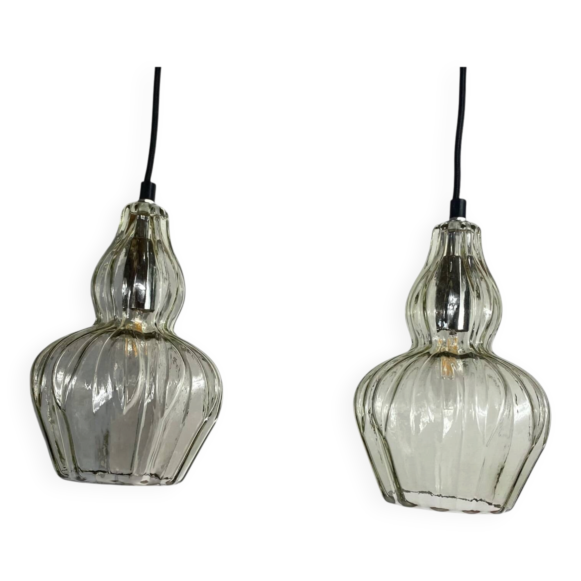 Pair of vintage glass pendant lights.