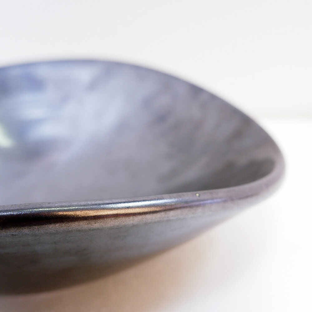 Decorative dishes or vintage ceramic grey glazed catchalls.