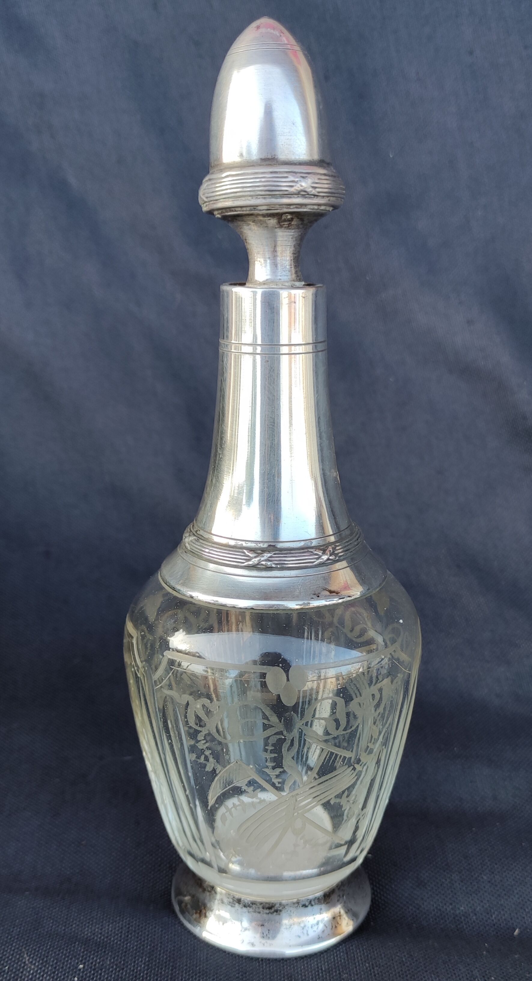 Old silver metal carafon