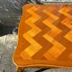 Antique extendable table in cherry wood and marquetry in the Louis XV style.