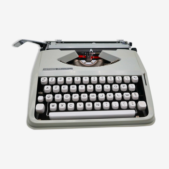 Machine à écrire Hermes Baby vert tilleul cursive révisée ruban neuf