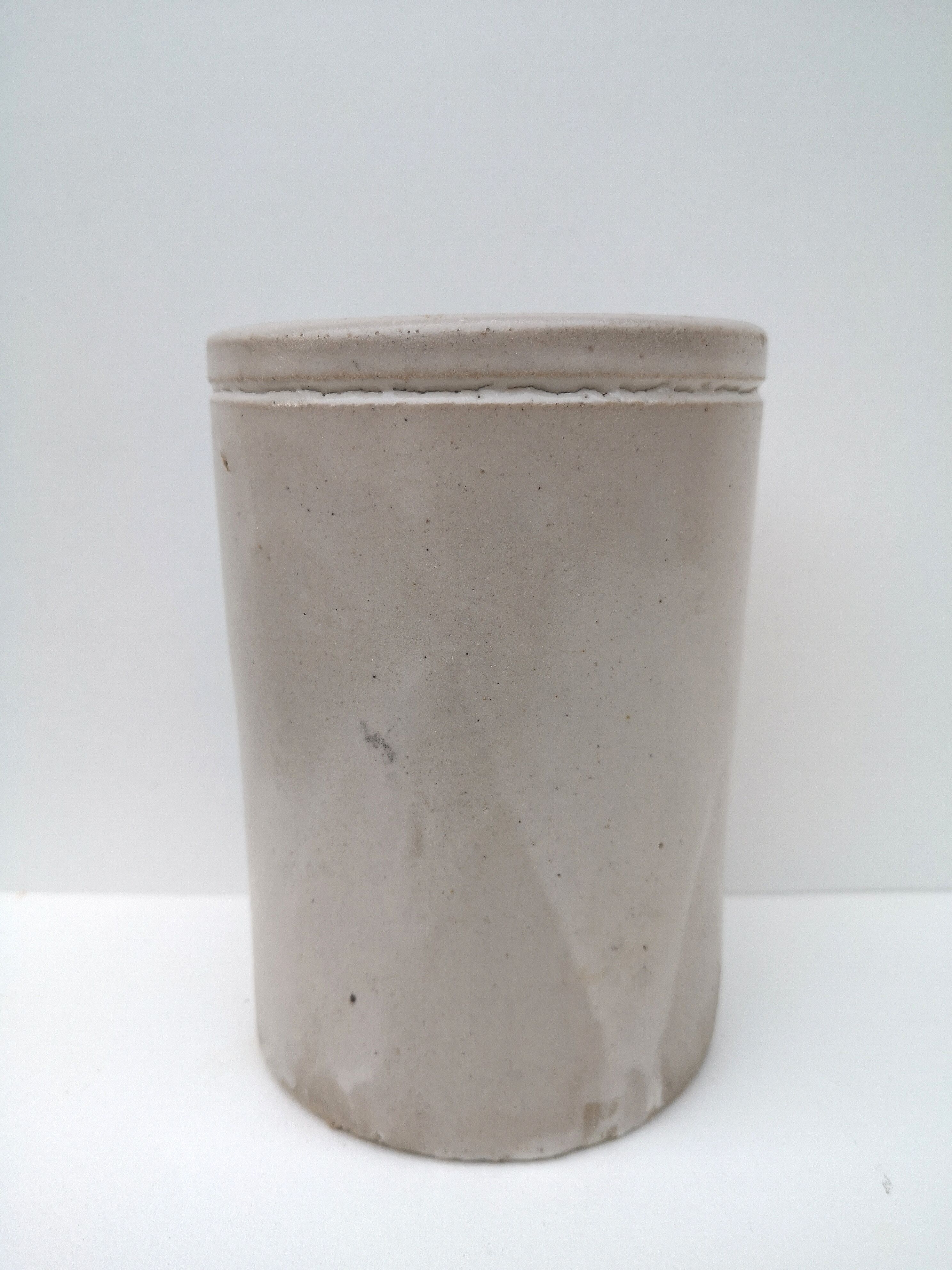 Old pot in glazed stoneware