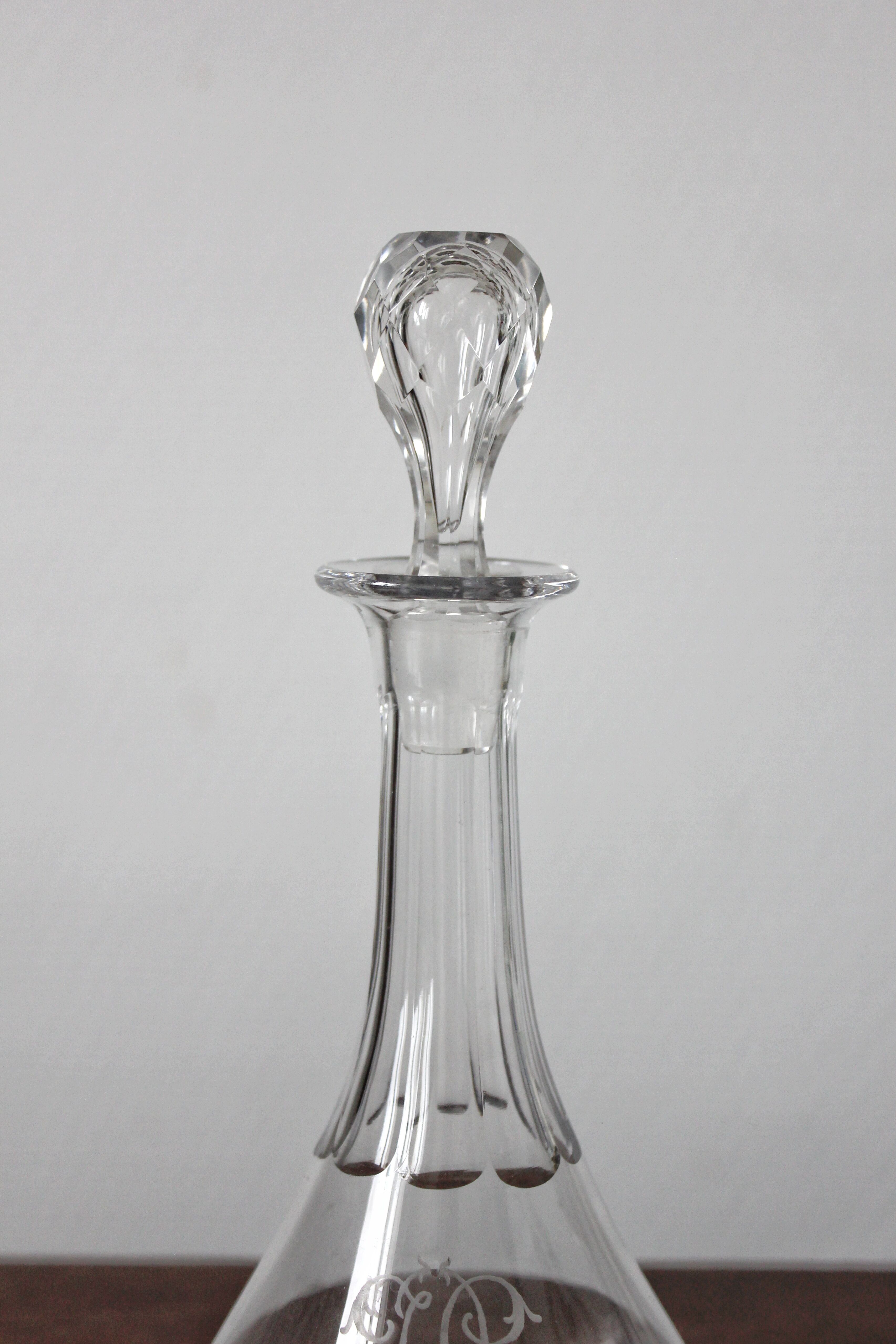 Antique crystal liqueur decanter with engraved monogram and flat ribs