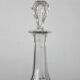 Antique crystal liqueur decanter with engraved monogram and flat ribs