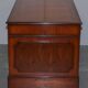 Partner desk with double pedestal in burr yew wood with decorated top.