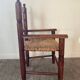 Vintage wooden armchair and straw seat for children