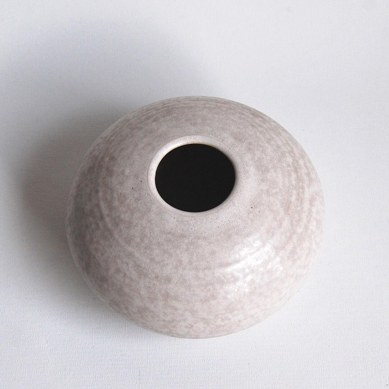 Vintage white ceramic ball vase