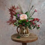 Amber glass and wicker carafe