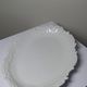 Antique deep dish in white Limoges porcelain, with rockwork relief.