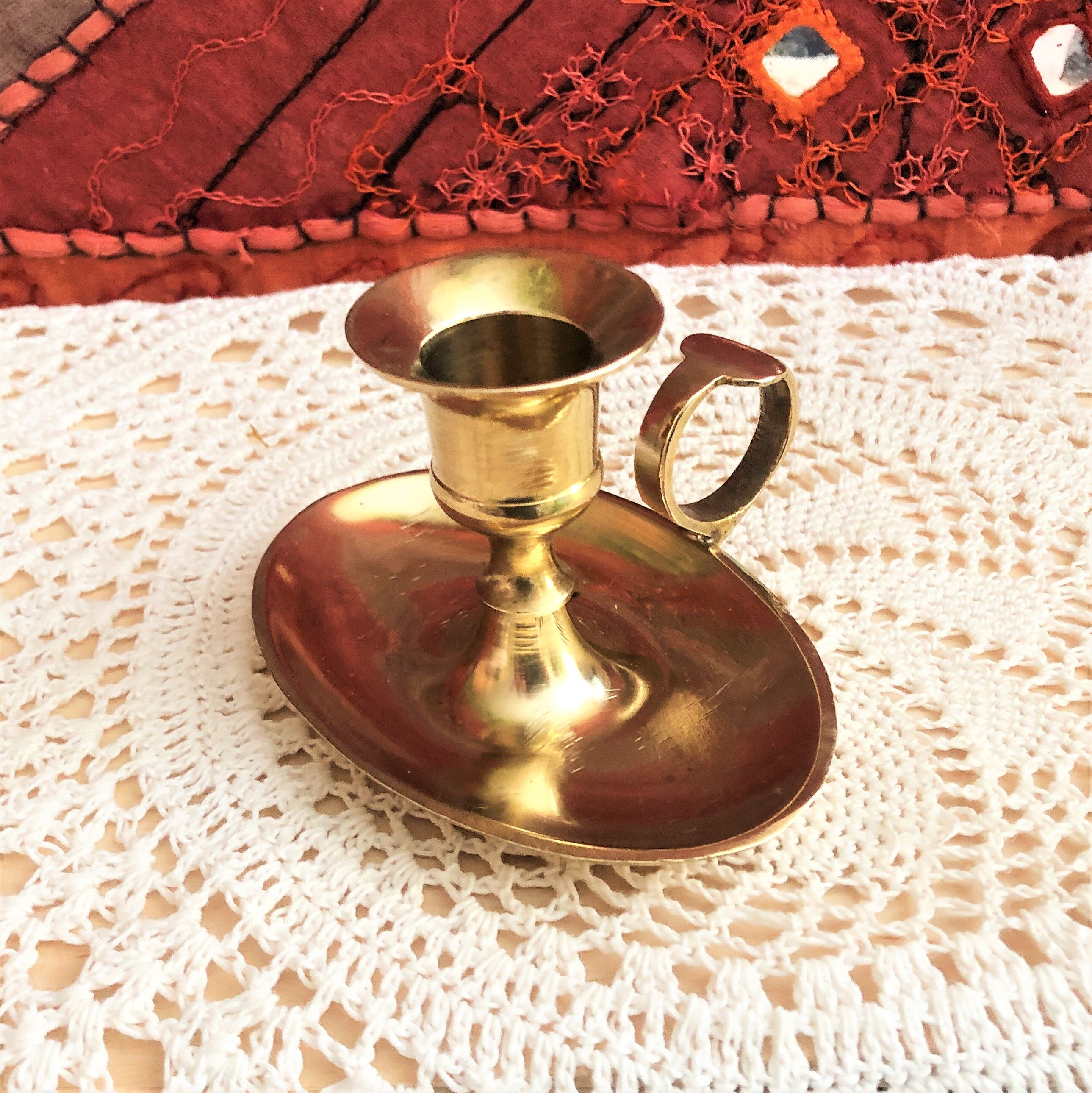 Brass oval hand candle holder
