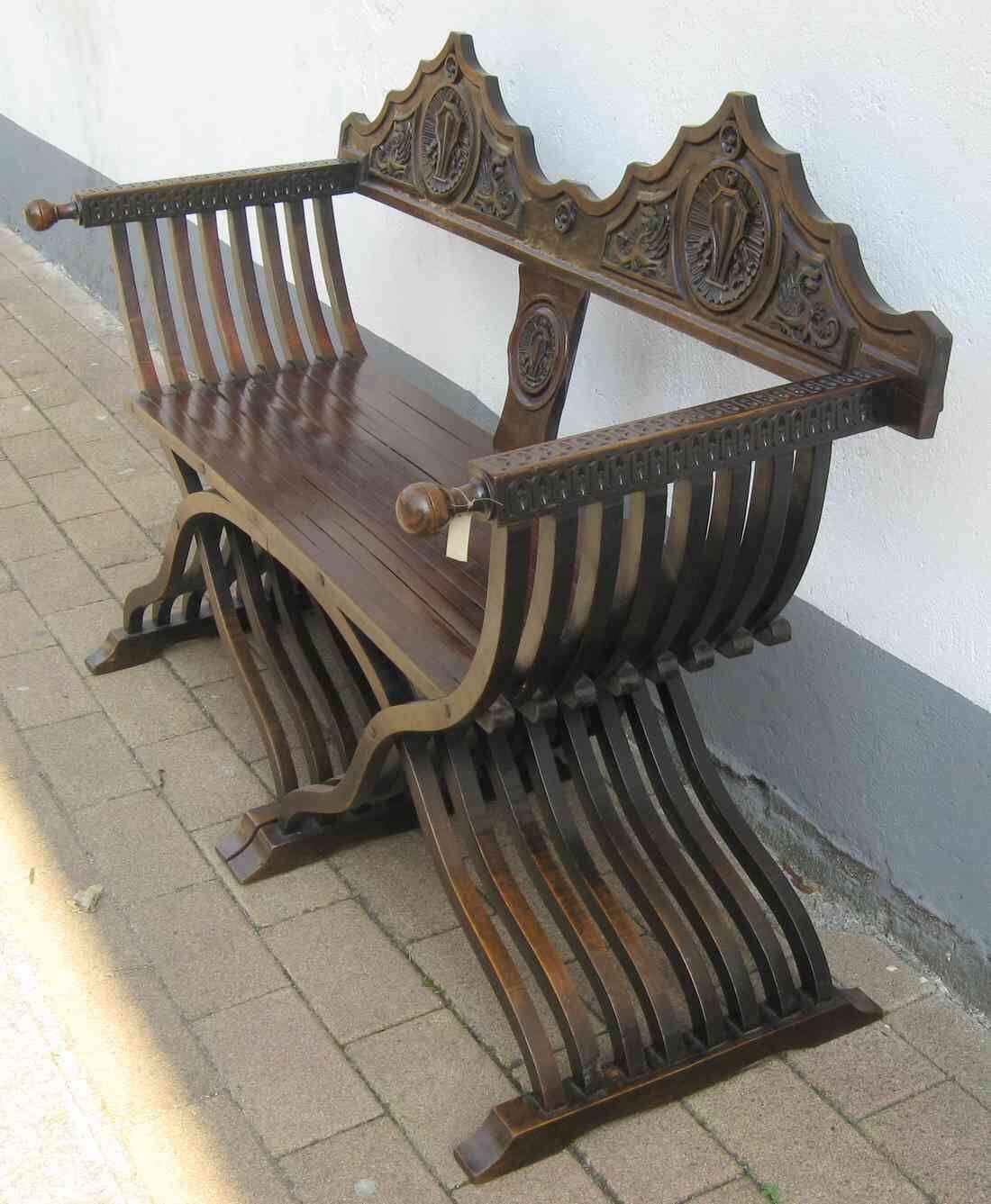 Restored antique Savonarole canapé with wax and yellow lacquer.