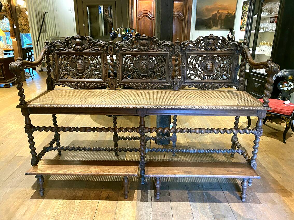 Large, richly carved neo-Renaissance oak billiard bench, 19th century