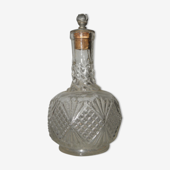 Bouteille de parfum fleur de lys en verre