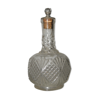 Bouteille de parfum fleur de lys en verre