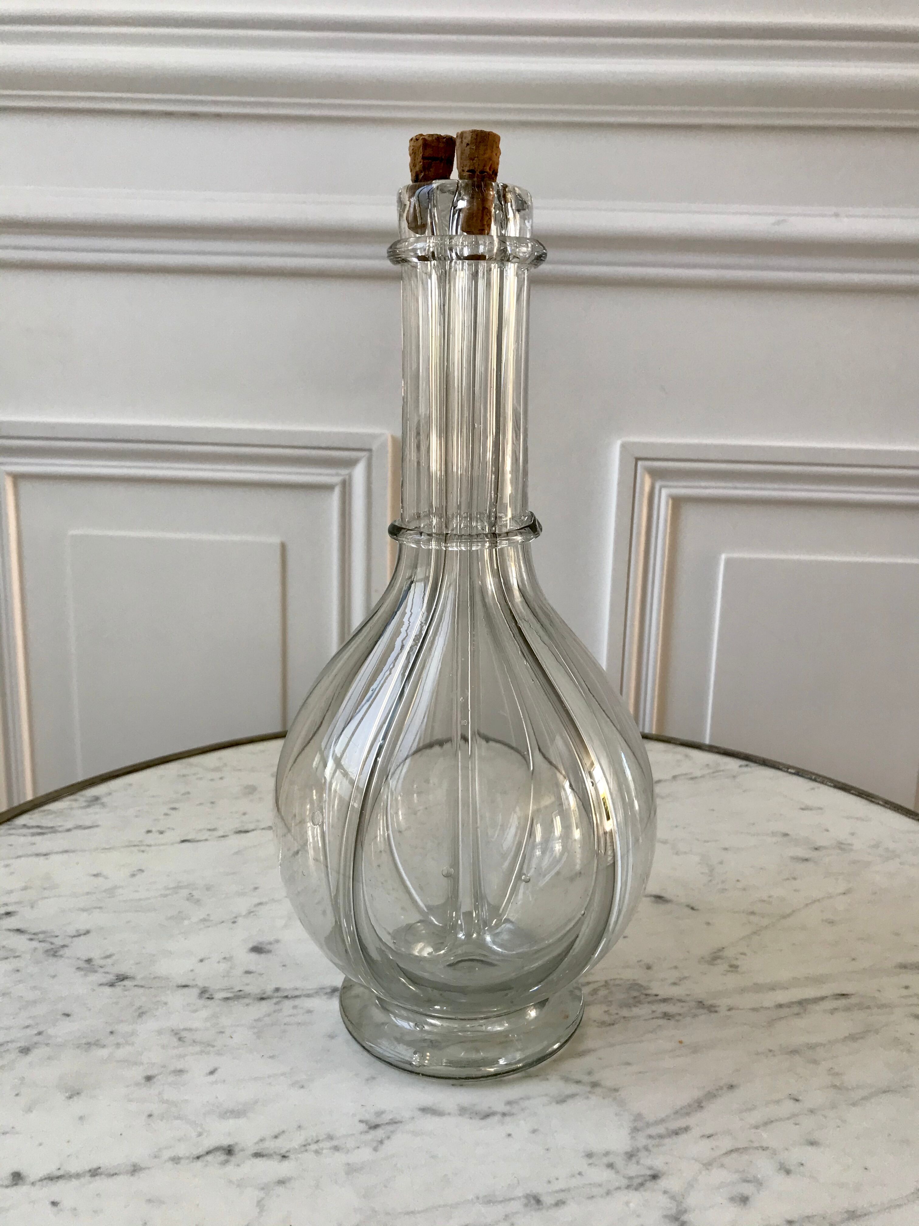 Liquor decanter with molded glass compartments early XXth