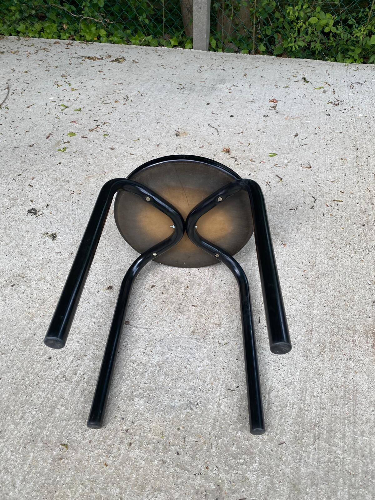 Black curved wooden stool