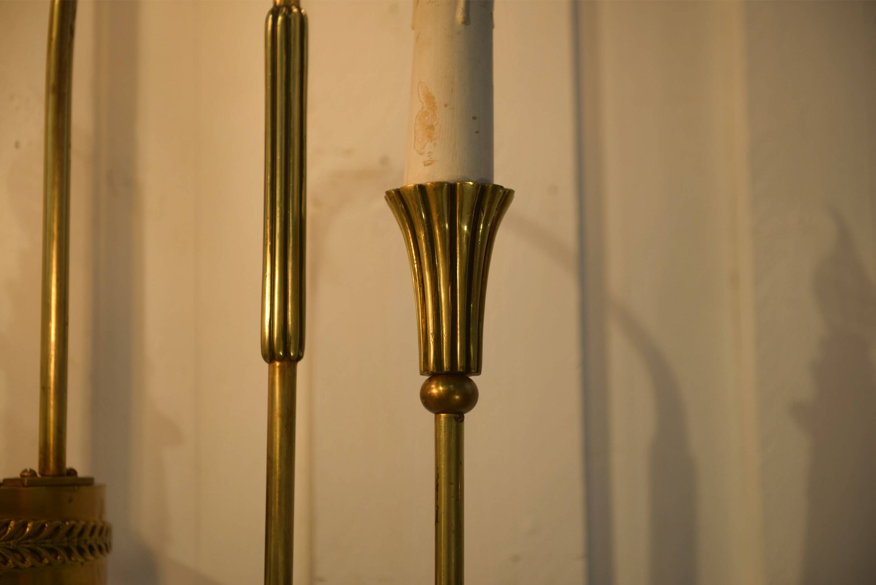 Monumental bronze wall light with three arms, neoclassical Art Deco from the 1940s.