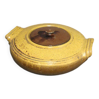 Old pottery tripière in glazed terracotta.