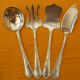 Set of 4 cutlery with silver metal cutlery SAINT MEDARD.