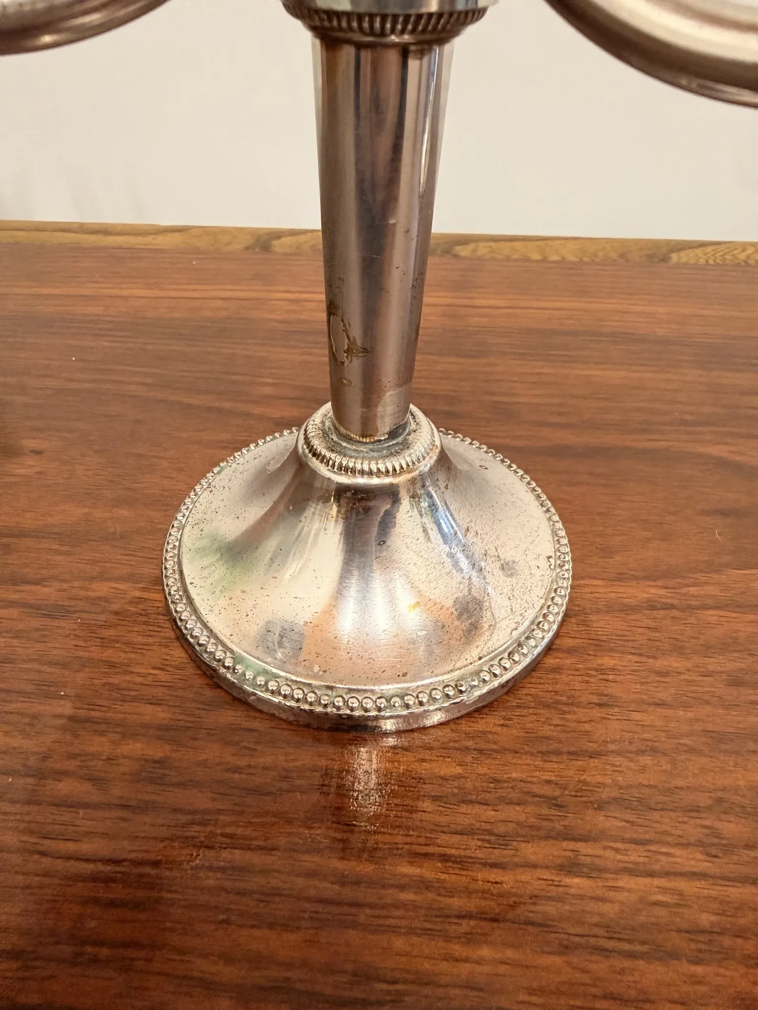 Pair of vintage three-branch silver-plated candlesticks