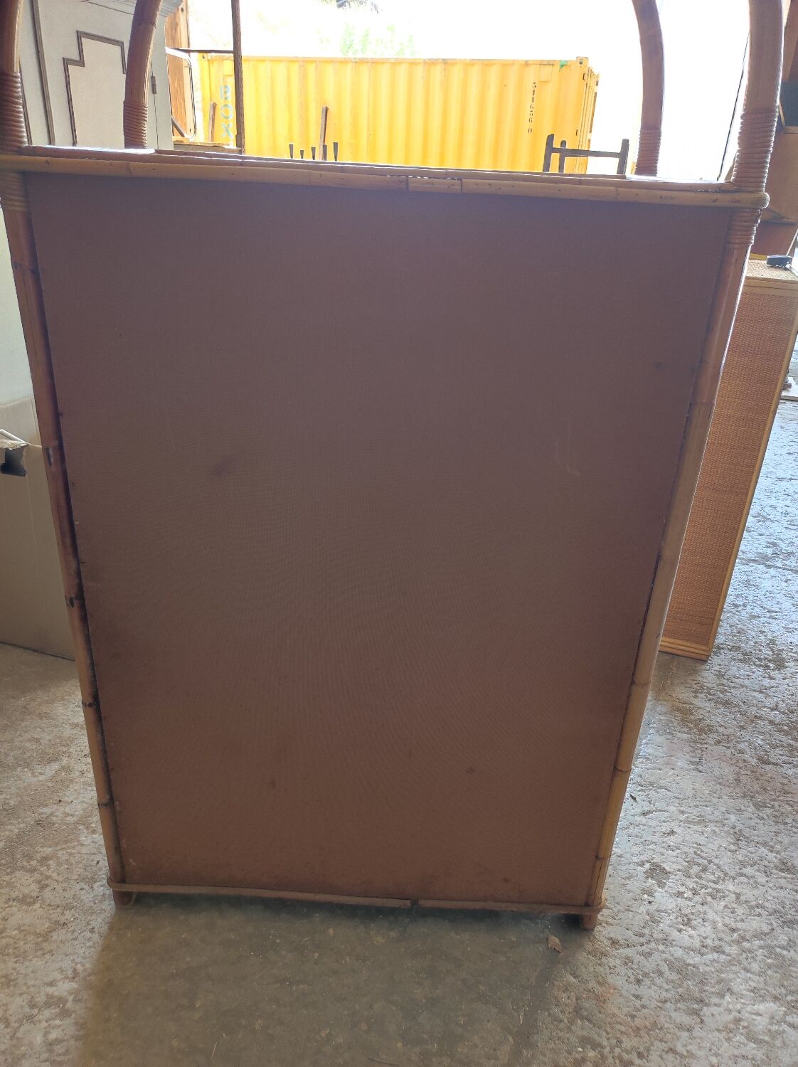 Two-door wicker and bamboo wardrobe