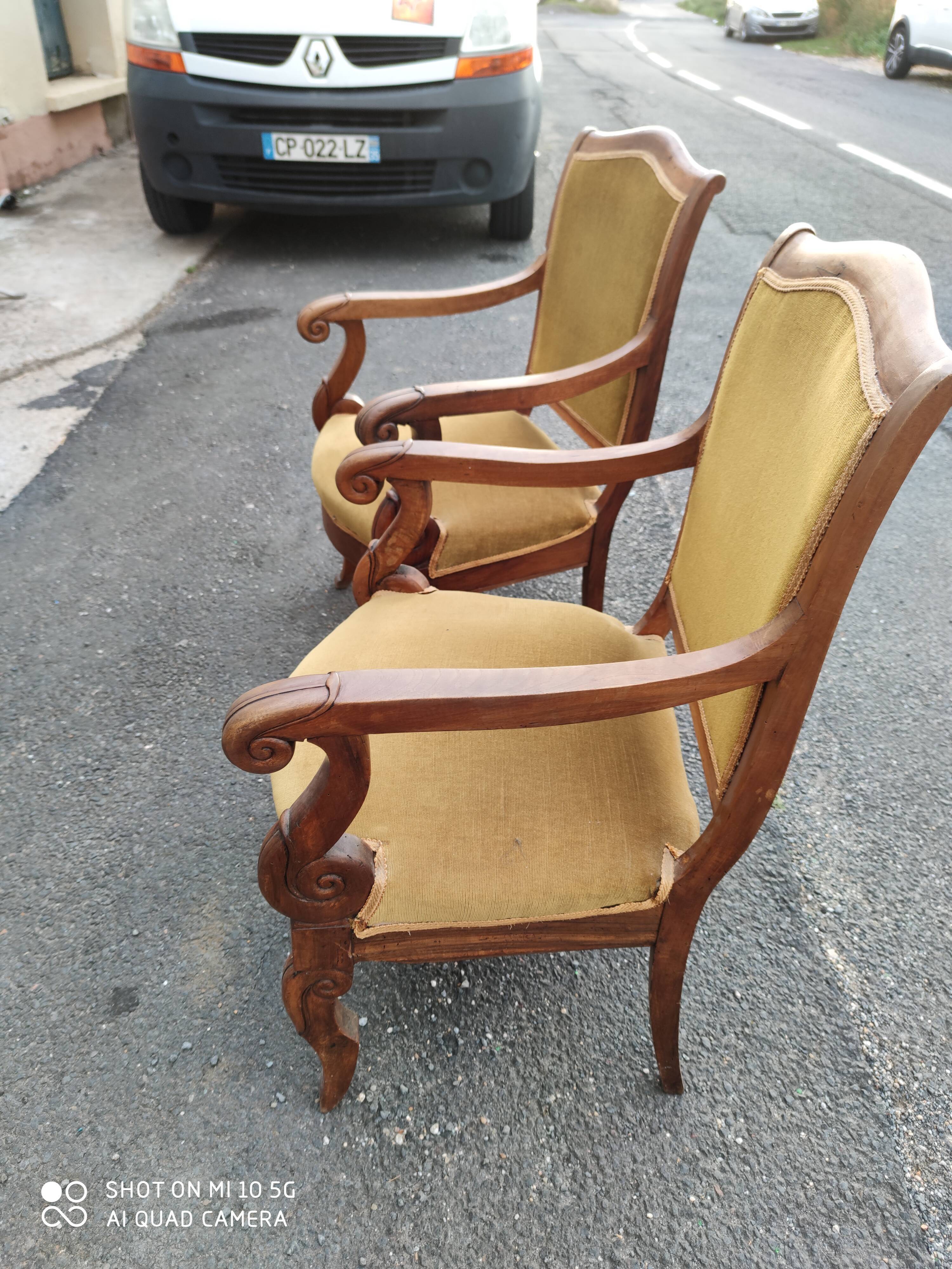Pair of walnut armchairs from the Consulate period