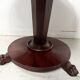 Empire style round table with claw feet, 19th century.