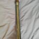 Golden wooden corner column and marble